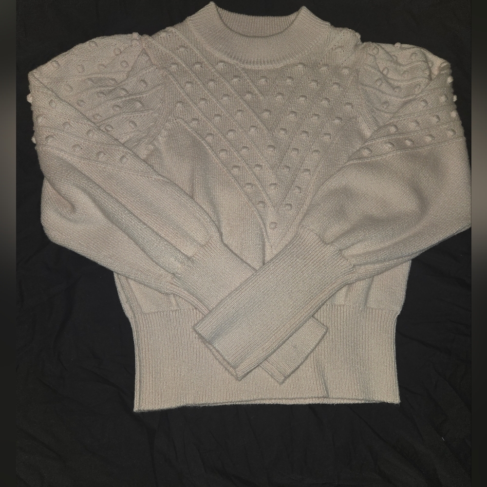 Soft pink knitted sweater